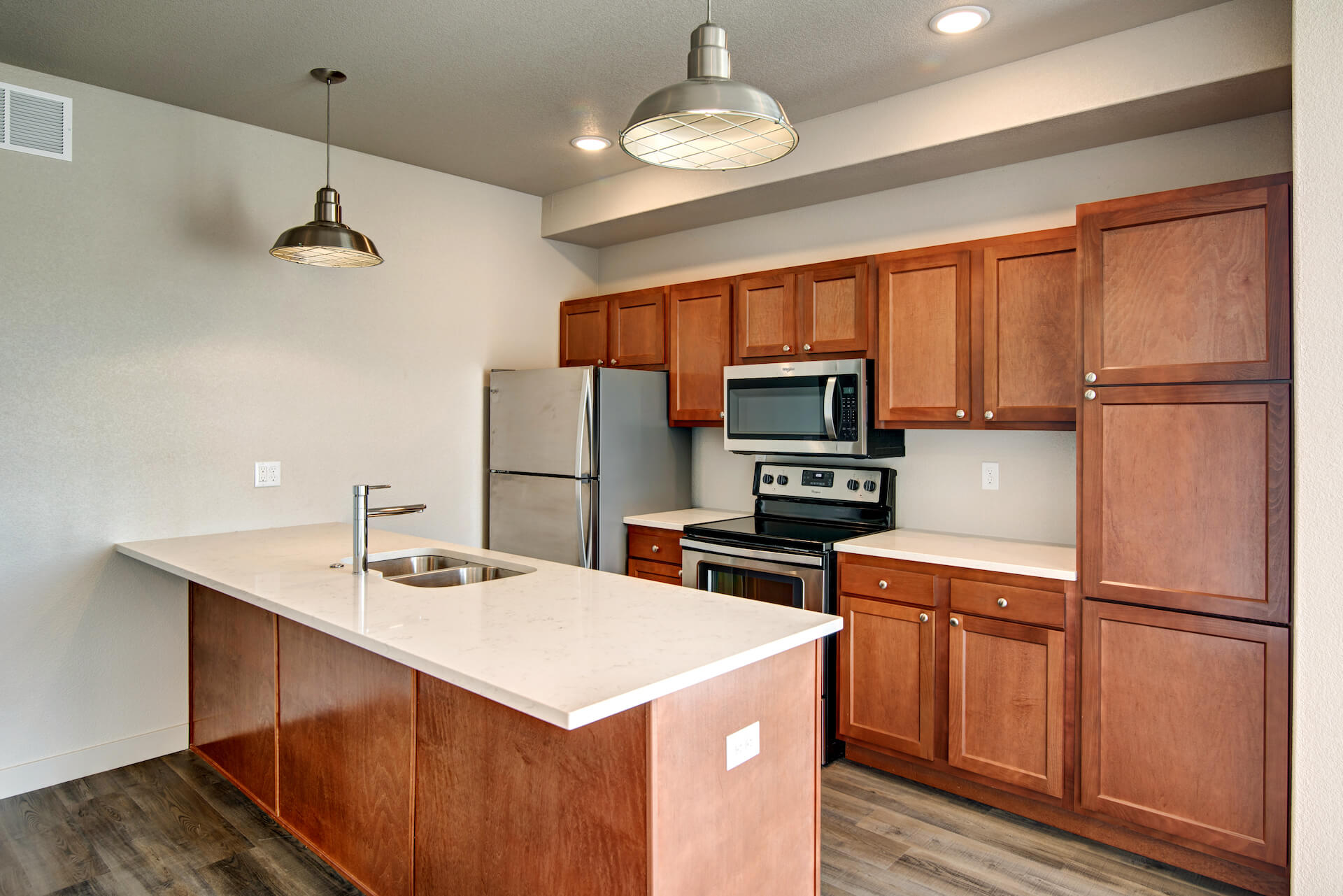 fully furnished kitchen area of a 12b lofts apartments